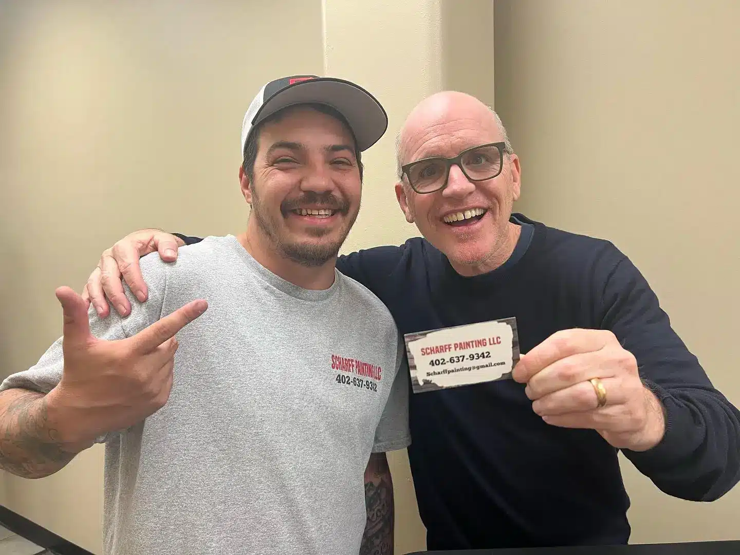 Endorsement photo of community influencer and Scharff Painting team at a local gathering