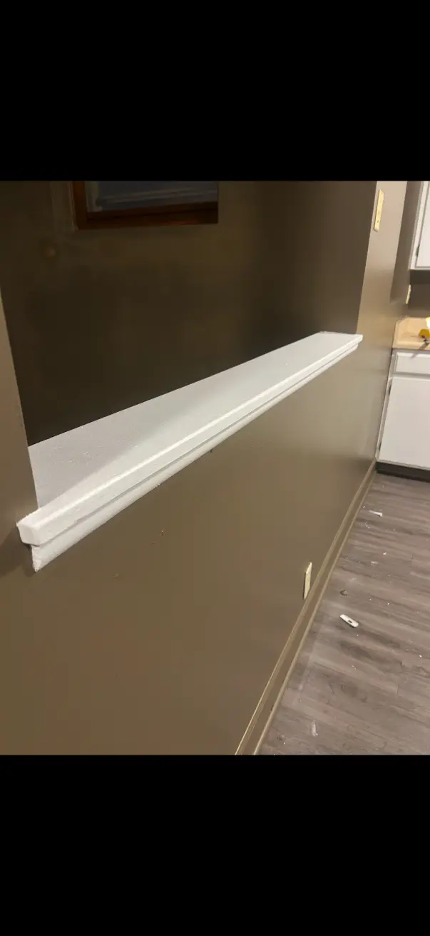 Freshly painted house interior with beige and white trim by Scharff Painting in Nebraska