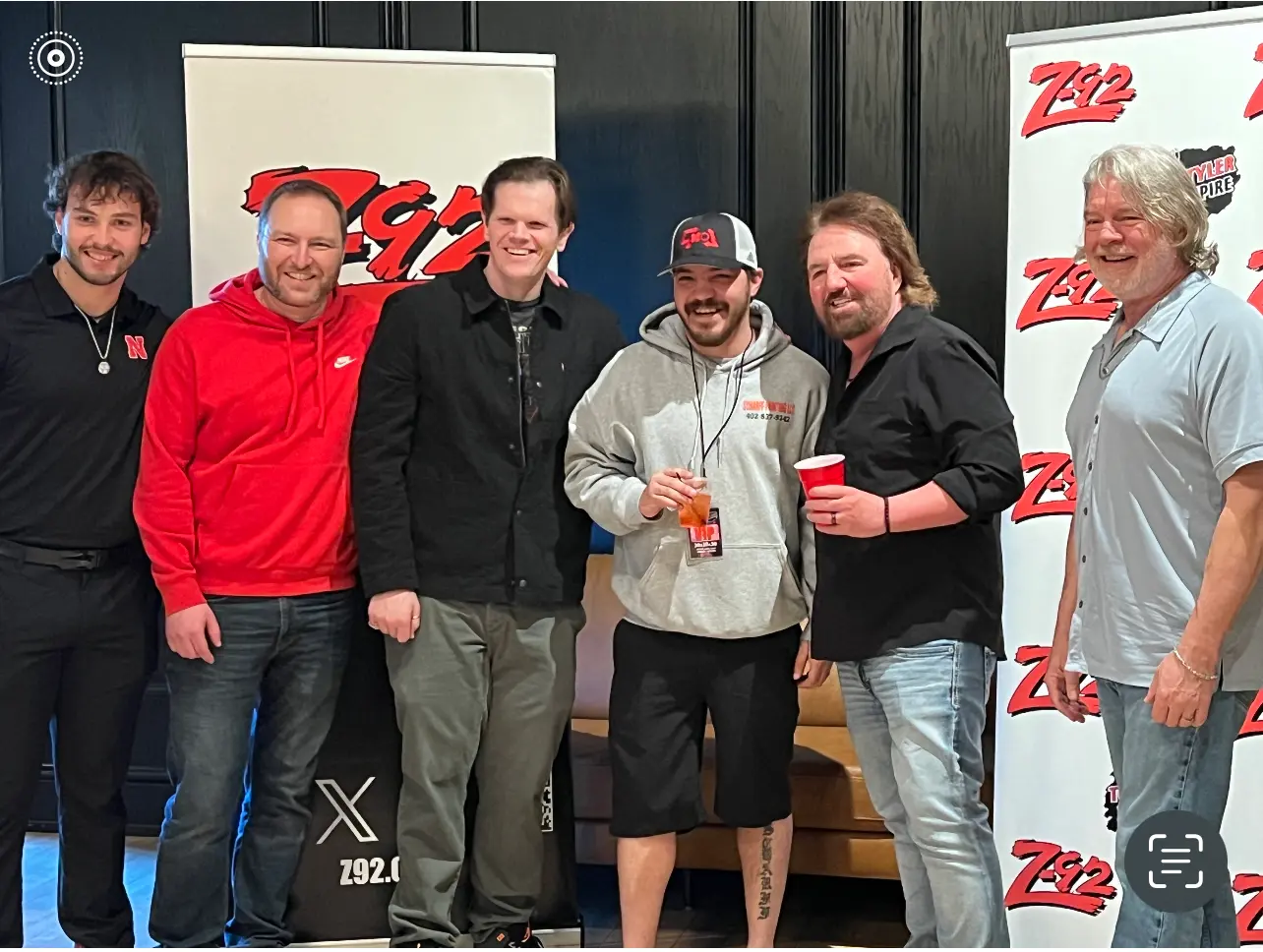 Endorsement photo of community influencer and Scharff Painting team at a local gathering